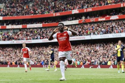 Saka celebrating his goal after scoring a penalty against Bournemouth