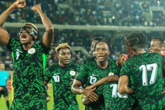 Super Eagles players celebrate a goal