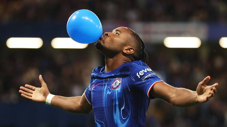 Christopher Nkunku celebrates a goal at Chelsea