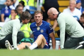 Liam Delap receiving treatment at Chelsea