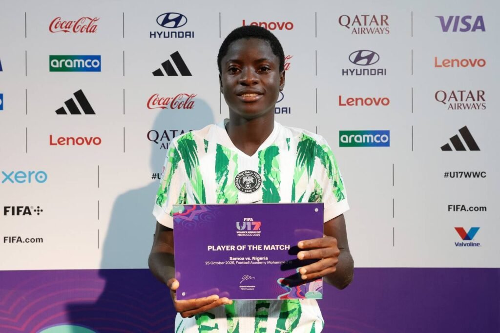  Queen Joseph holds her Player of the Match award after Nigeria’s 4–0 win over Samoa at the 2025 FIFA U17 Women’s World Cup.