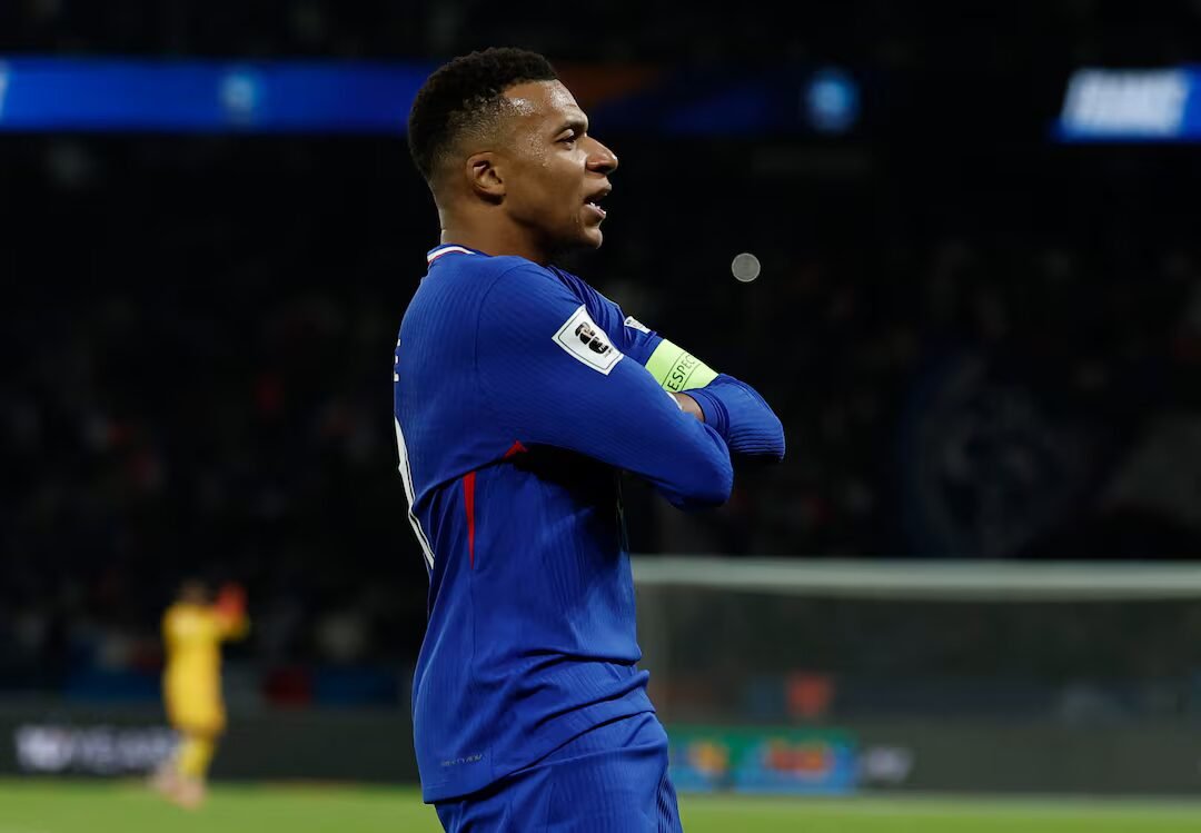 kylian mbappe celebrating a goal for france