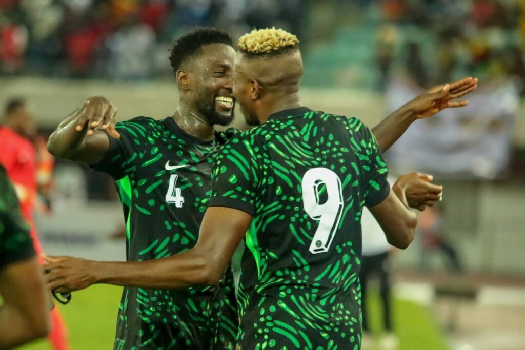 Victor Osimhen and Ndidi celebrating after Nigeria win vs Lesotho