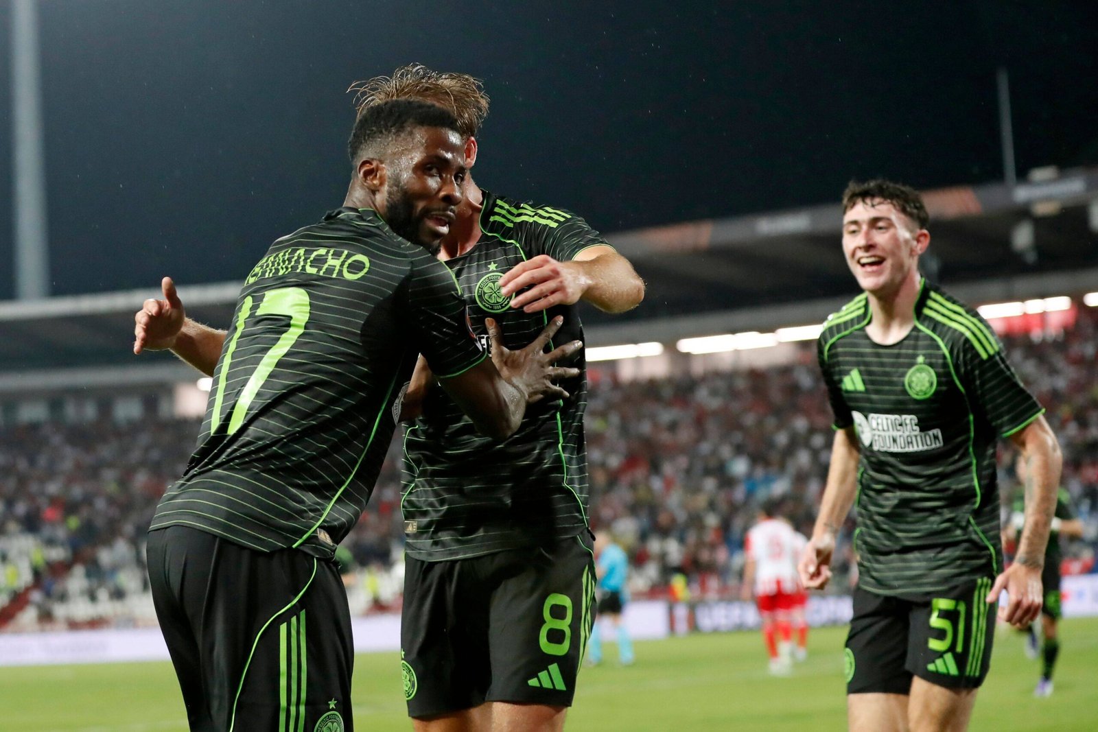 iheanacho celebrating a goal with his celtic teammates 