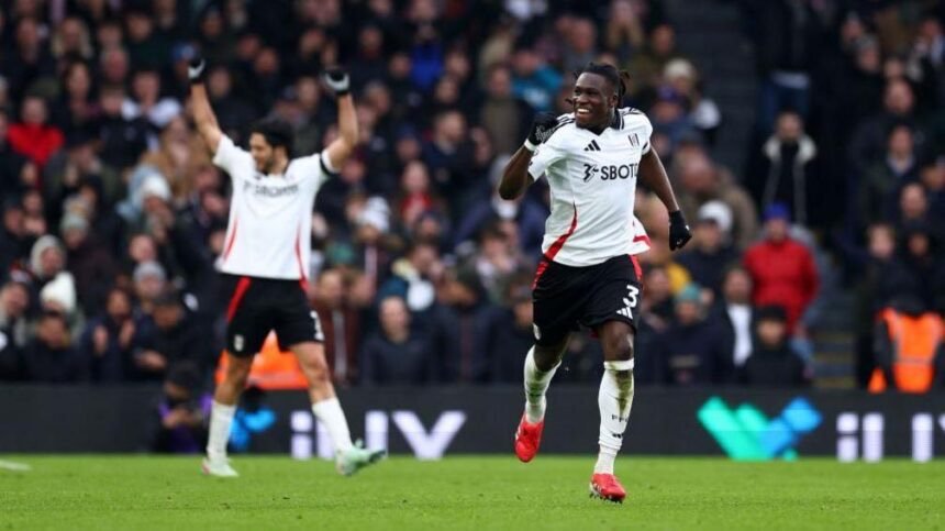 calvin bassey and raul jimenez celebrating a goal for fulham