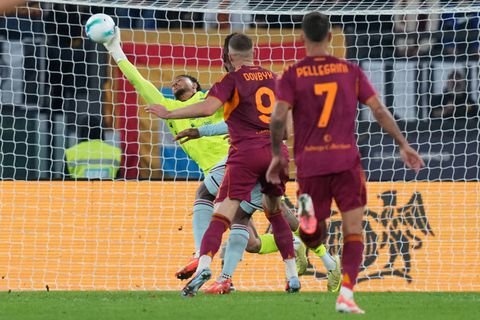 maduka okoye makes a save against as roma in a serie a match