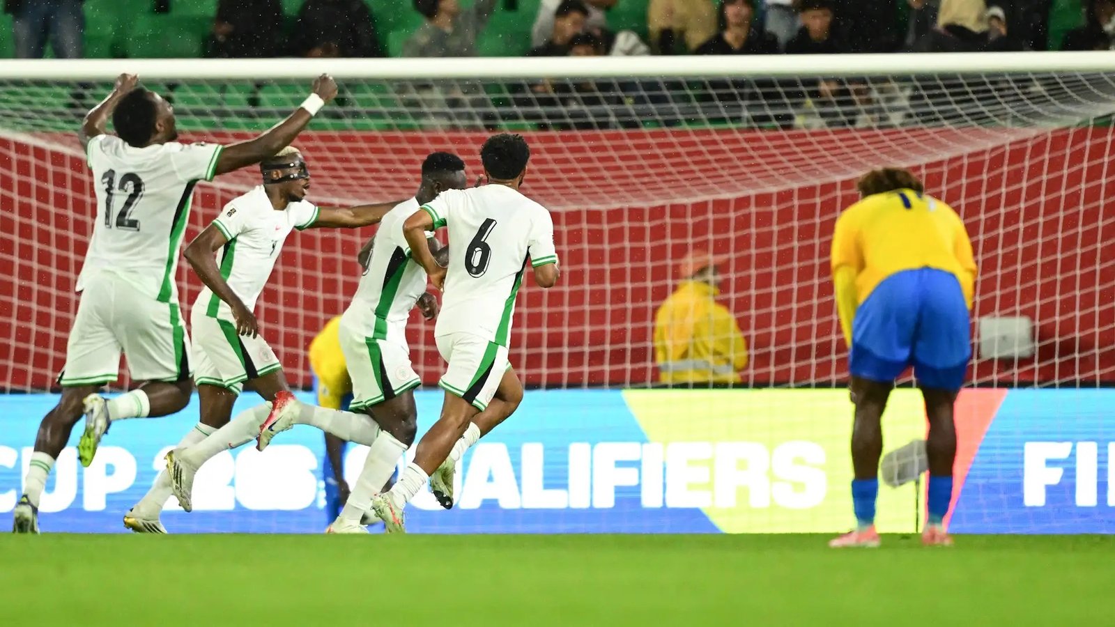 nigerian players celebrating a goal against gabon