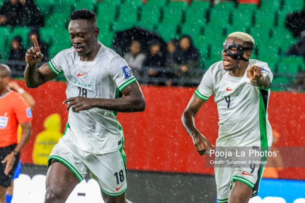 Akor Adams celebrates with Victor Osimhen after scoring Nigeria’s opener against Gabon.