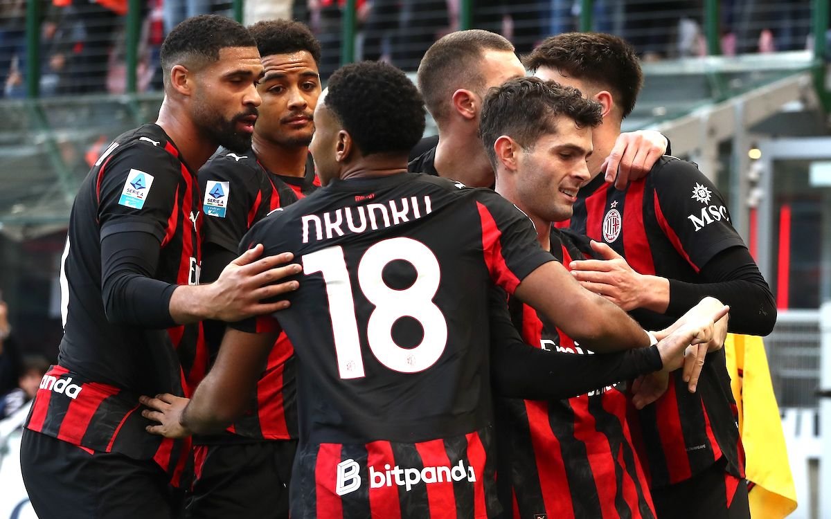 ac milan players celebrate their goal against hellas verona