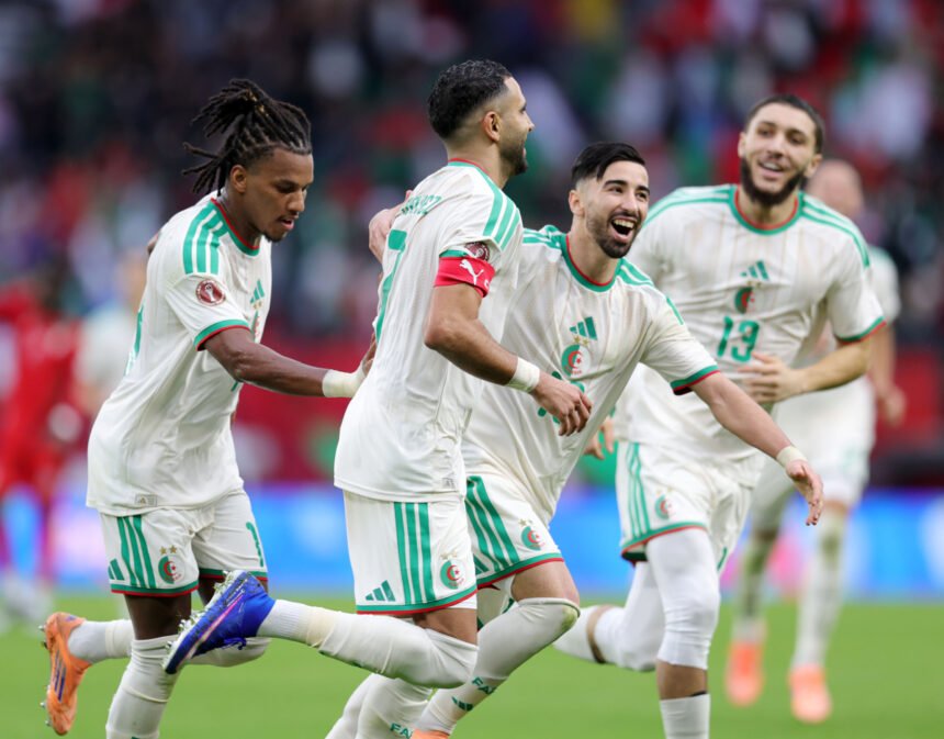 Algeria players celebrate a goal