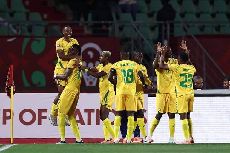 zimbabwe players celebrate their shock goal against egypt at afcon 2025