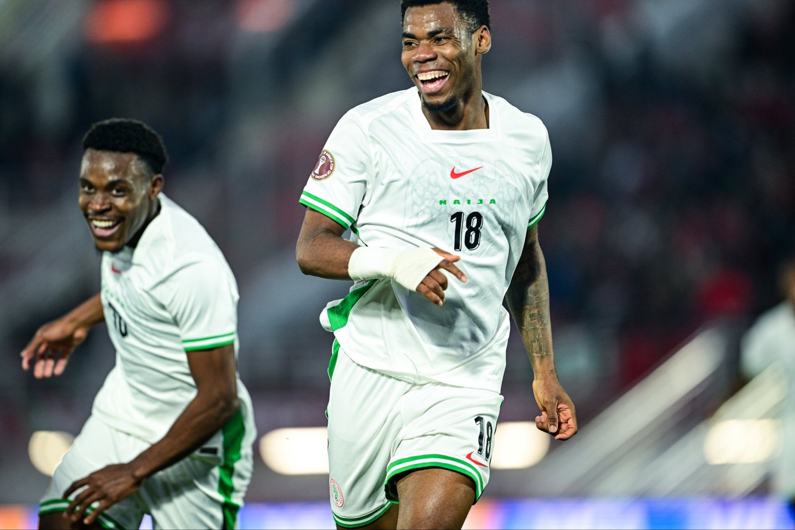 raphael onyedika wheels away in celebration after scoring for nigeria against uganda