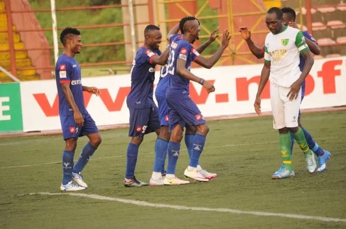 rivers united players celebrating a goal