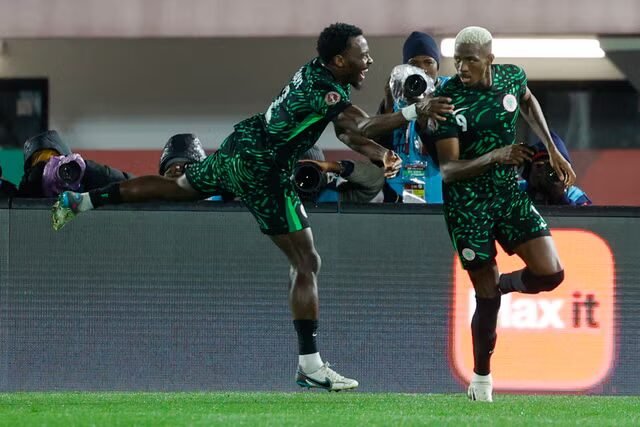 victor osimhen and osayi-samuel celebrate nigeria’s opener against Tunisia 