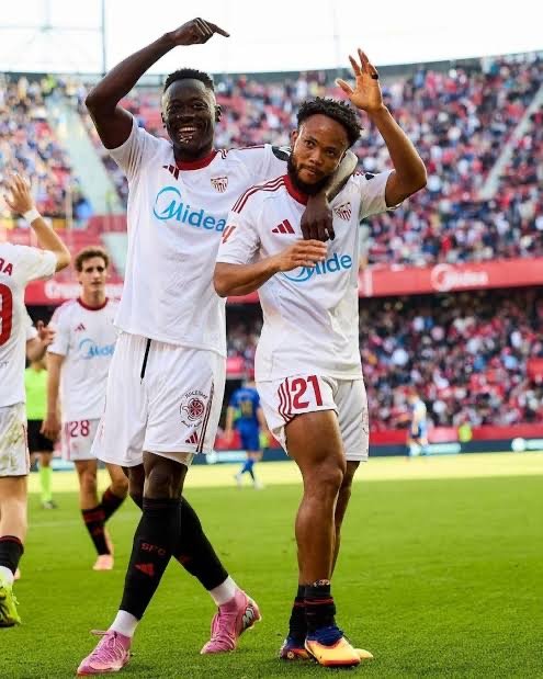 akor adams and chidera ejuke celebrate scoring for sevilla