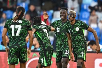 victor osimhen celebrates his goal against algeria with his nigeria teammates