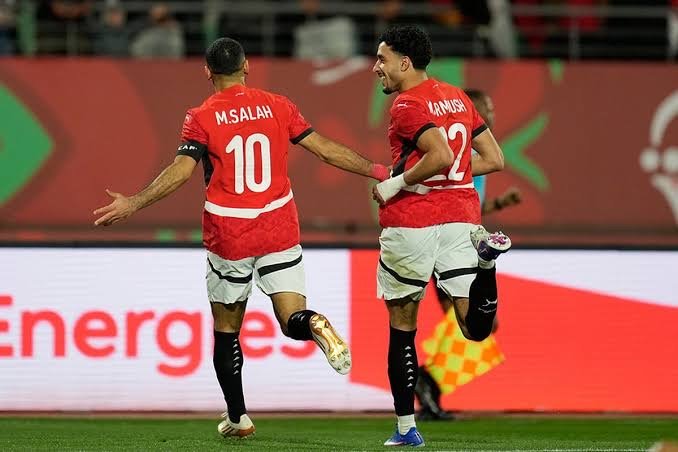 mohamed salah and omar marmoush celebrate a goal for egypt