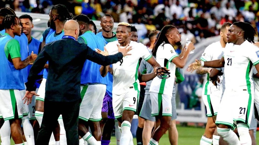 eric chelle and super eagles celebrate after a match