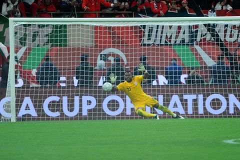 stanley nwabali saves a penalty kick during the semifinal clash between nigeria and morocco