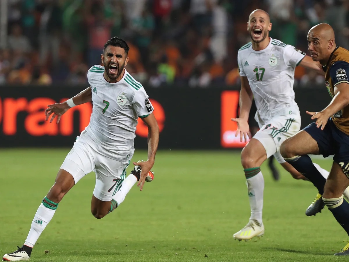 riyad mahrez celebrates after netting a late goal for algeria against nigeria at afcon 2019