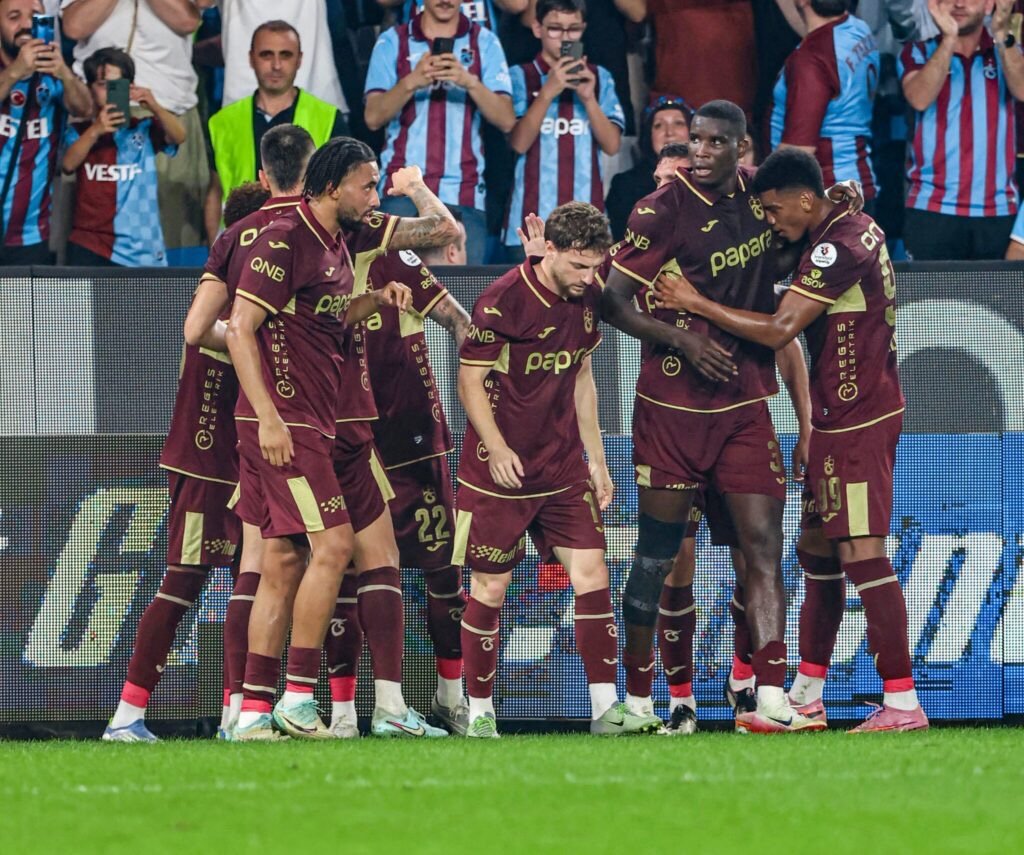 paul onuachu celebrates with his trabzonspor teammates