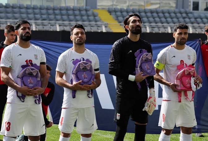 iran players pay tribute to victims of deadly school attacks ahead of their friendly match against nigeria