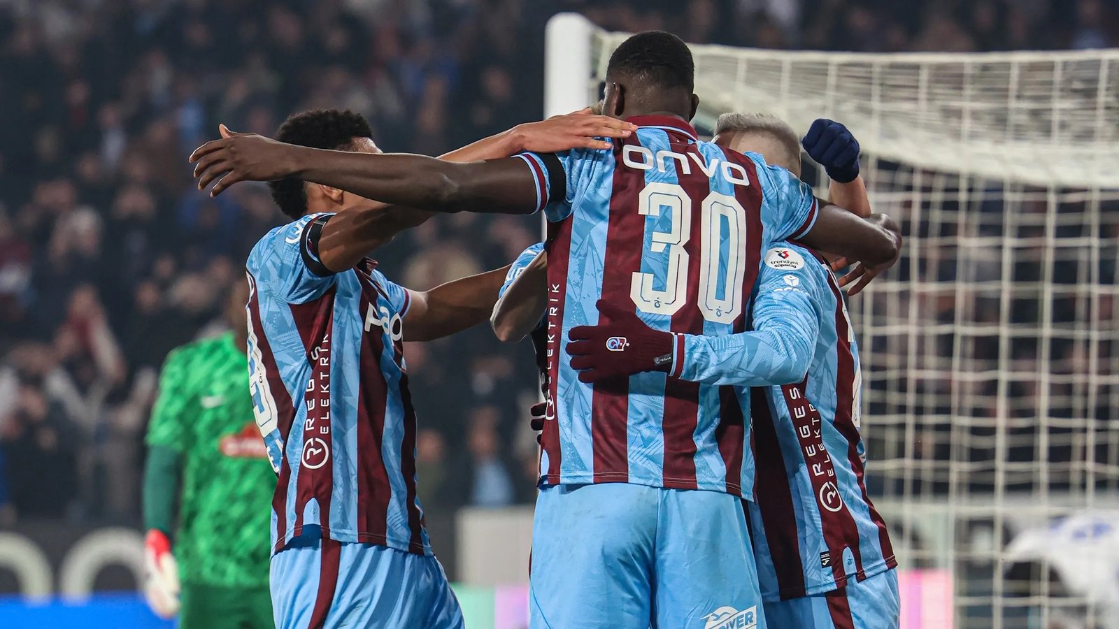 paul onuachu celebrates a goal with his teammates at trabzonspor