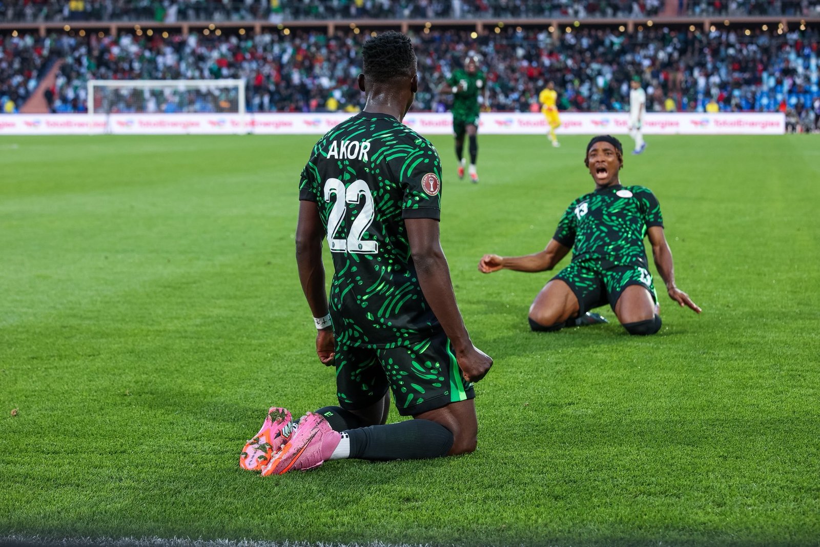 bruno onyemaechi and akor adams celebrate a goal for the super eagles