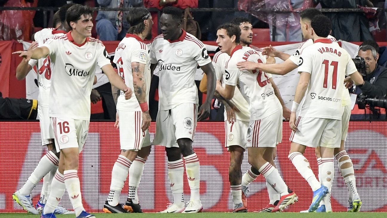 akor adams celebrates with his sevilla teammates