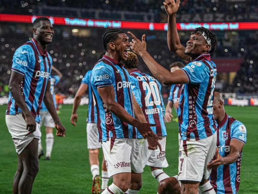 trabzonspor celebrates after scoring against galatasaray in a turkish super league match