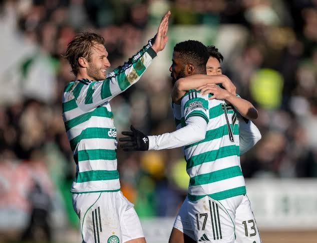 iheanacho celebrates with teammates after scoring the winner in celtic’s 2-1 triumph at dundee