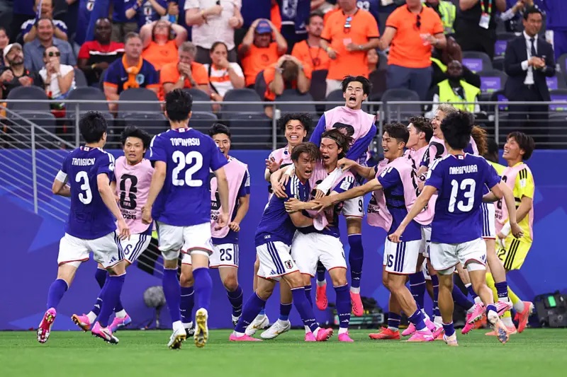 japan players celebrate goal against netherlands