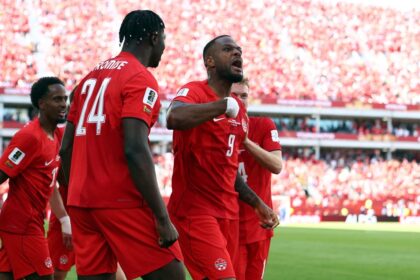 cyle larin celebrate with canada after scoring against bosnia