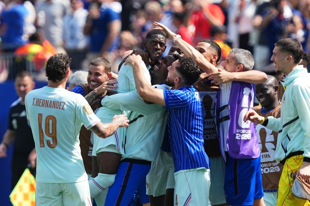 dembele celebrates with france after scoring